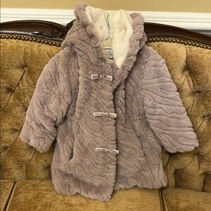 Stunning American Widgeon Lavender sequence faux fur hooded coat.